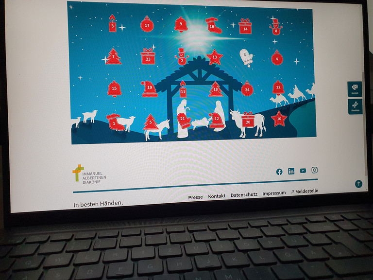 Bildschirm eines Notebooks mit geöffneter Internetseite Online-Adventskalender der Immanuel Albertinen Diakonie Bildschirm eines Notebooks mit geöffneter Internetseite Online-Adventskalender der Immanuel Albertinen Diakonie